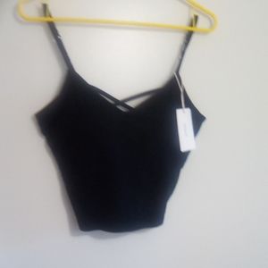 Black knit camisole with built in bra with wires.